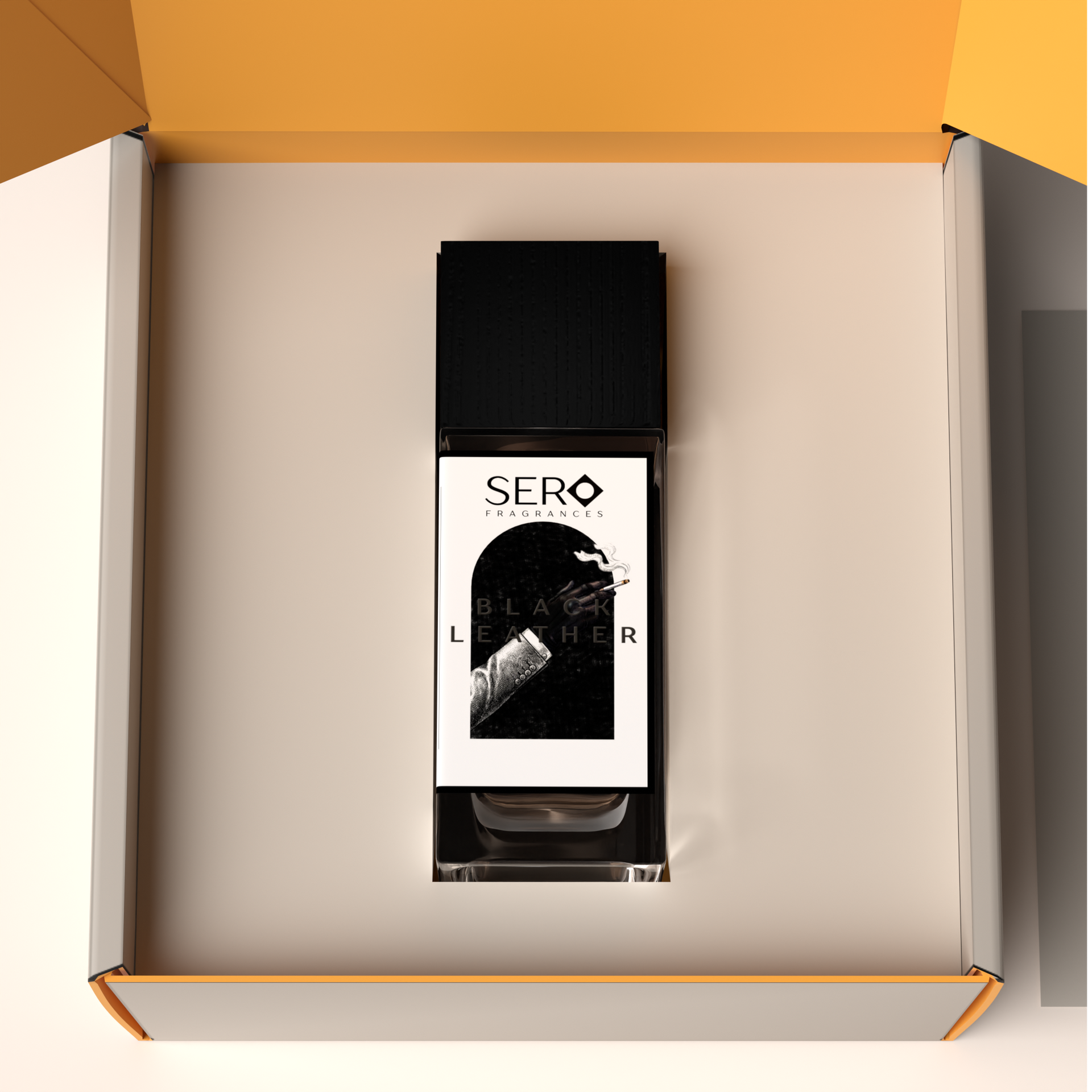 Top view of a packaging within it a minimalist clear glass perfume bottle with black wood cap containing SERO fragrance inspired by TOM FORD's Ombré Leather. 
