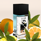 Corner view of a minimalist clear glass perfume bottle with black wood cap containing SERO fragrance inspired by LV Imagination. 