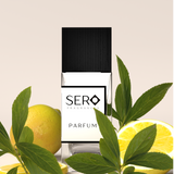 Sero Signature Fragrances parfum bottle with lemons and green leaves on a beige background